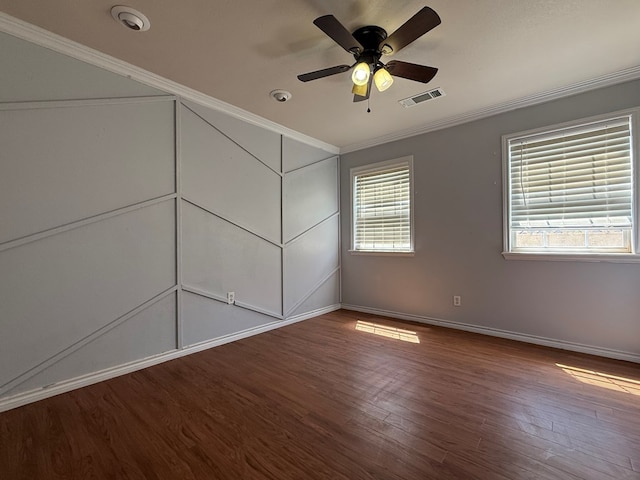 615 Placer Ave, Odessa, TX 79763 - unfurnished bedroom featuring wood finished floors, baseboards, ornamental molding, and a ceiling fan