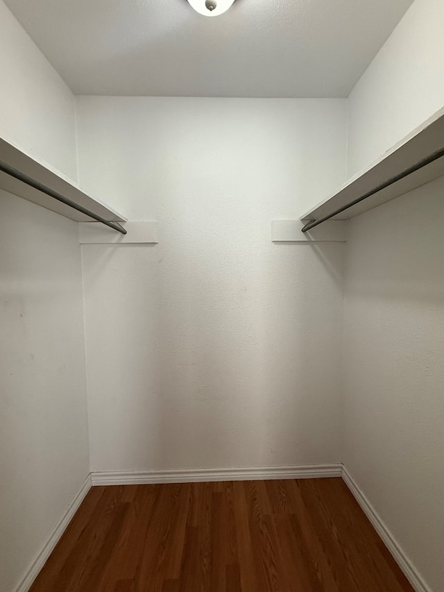 615 Placer Ave, Odessa, TX 79763 - spacious closet featuring wood finished floors