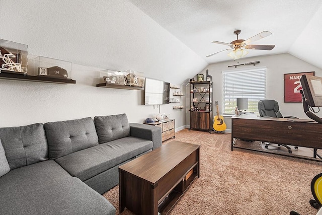 living room featuring a ceiling fan, baseboards, vaulted ceiling, and light carpet