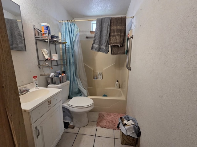 3301 N Jackson Ave, Odessa, TX 79762 - full bathroom featuring vanity, shower / tub combo, tile patterned floors, toilet, and a textured wall