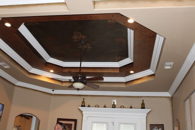 173 W 87th St, Odessa, TX 79764 - detailed view of a raised ceiling, ornamental molding, and a ceiling fan