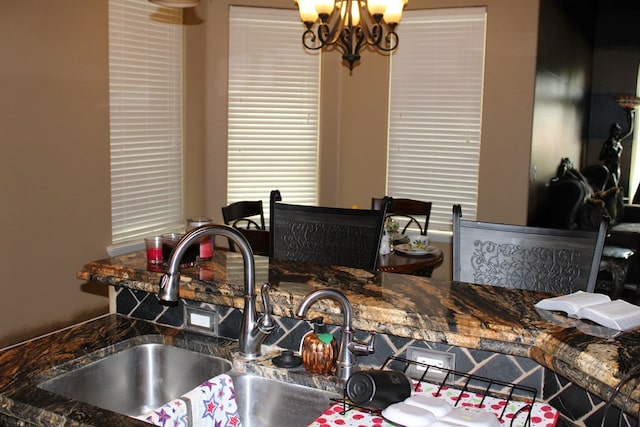 173 W 87th St, Odessa, TX 79764 - dining room with a chandelier