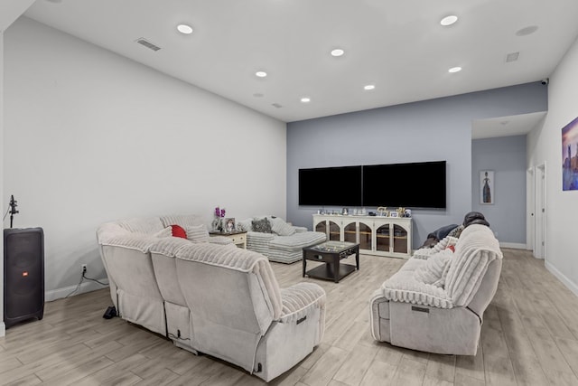 1758 N Fortune 500 Dr, Odessa, TX 79764 - living room featuring baseboards, recessed lighting, light wood-style flooring, and visible vents