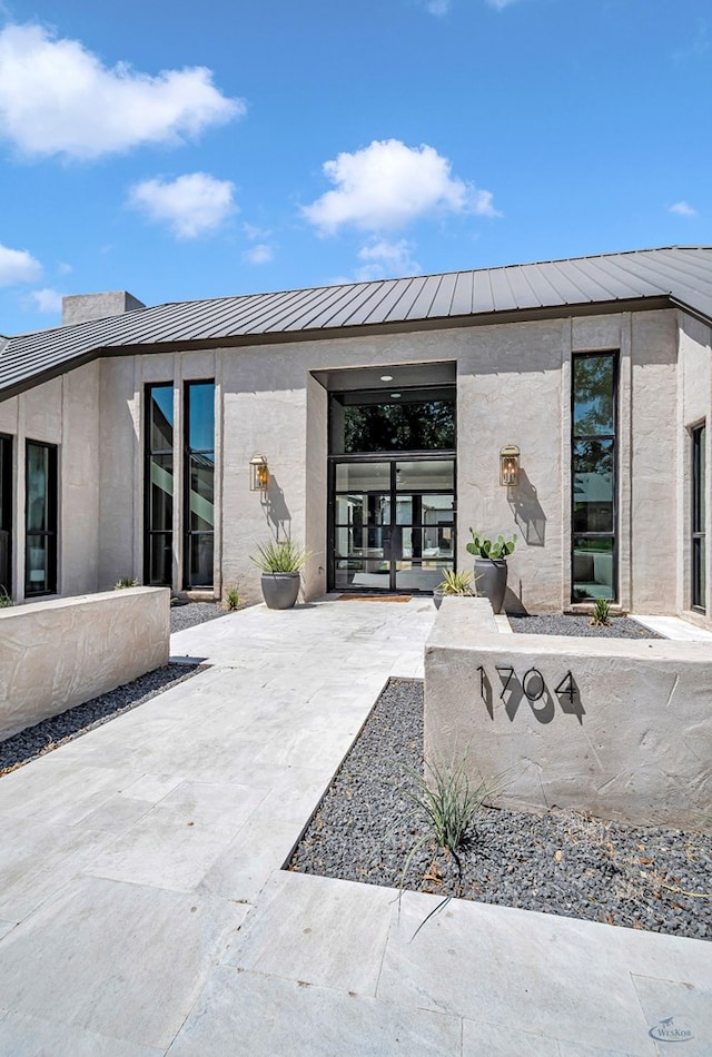 exterior space featuring stucco siding