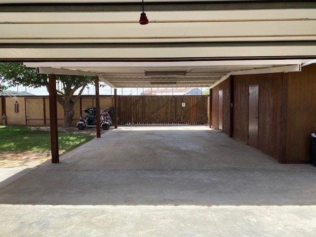1413 S Oak St, Pecos, TX 79772 - view of car parking with fence