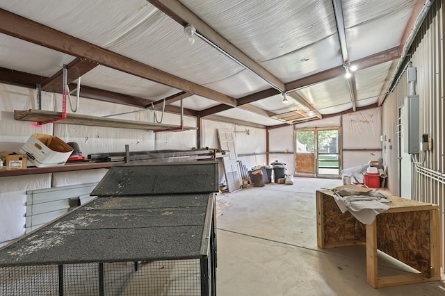 201 S Front St, Fort Davis, TX 79734 - miscellaneous room with unfinished concrete flooring, a garage, and a workshop area