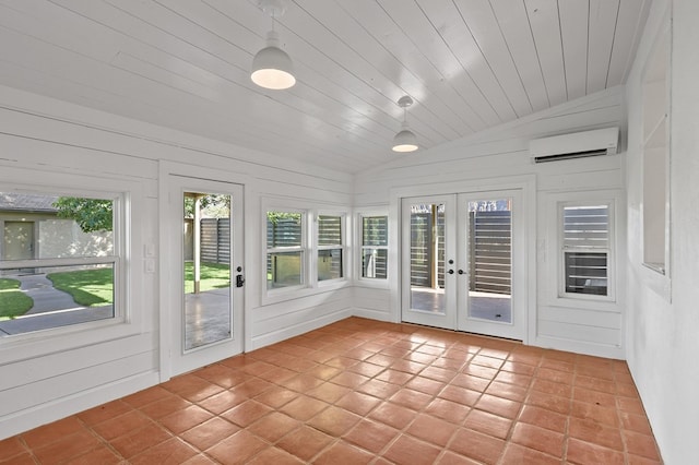201 S Front St, Fort Davis, TX 79734 - unfurnished sunroom featuring french doors, a wall mounted air conditioner, and vaulted ceiling
