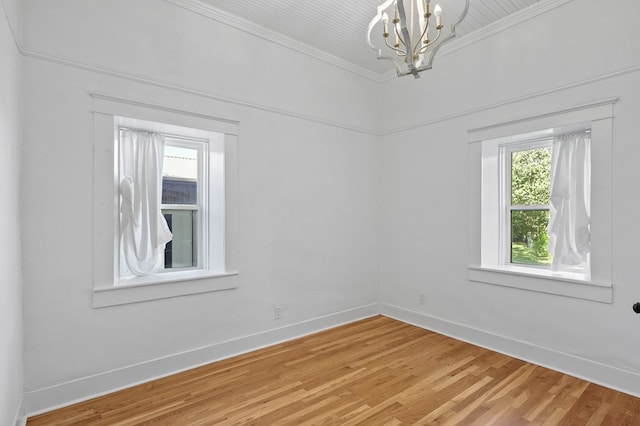 201 S Front St, Fort Davis, TX 79734 - empty room with crown molding, a chandelier, and light wood finished floors