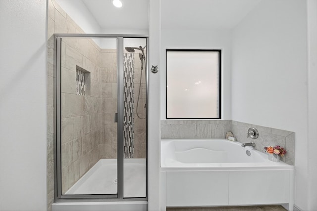 7410 W Pile Ranch Rd, Odessa, TX 79765 - bathroom featuring a bath and a stall shower