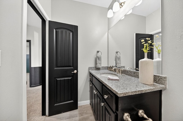 7410 W Pile Ranch Rd, Odessa, TX 79765 - bathroom featuring vanity and baseboards