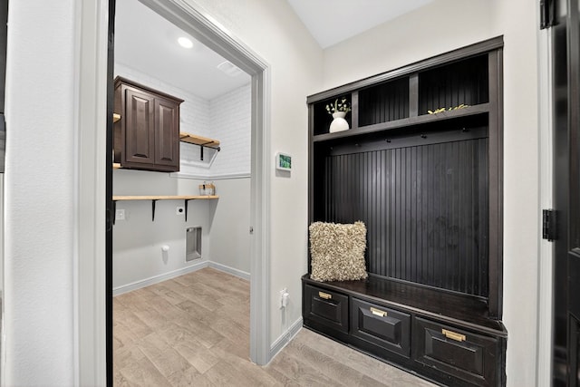 7410 W Pile Ranch Rd, Odessa, TX 79765 - mudroom featuring light wood-style flooring and baseboards