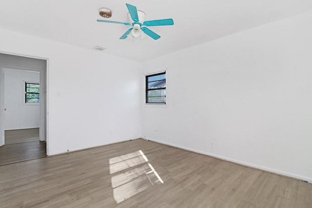 3633 Melody Ln, Odessa, TX 79762 - spare room with wood finished floors and a ceiling fan