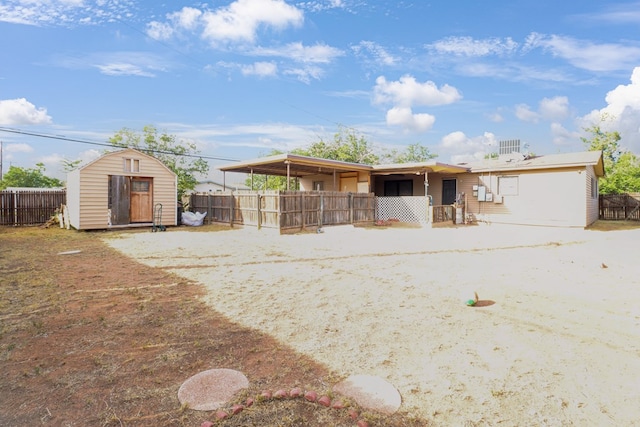 3633 Melody Ln, Odessa, TX 79762 - back of house with a storage shed
