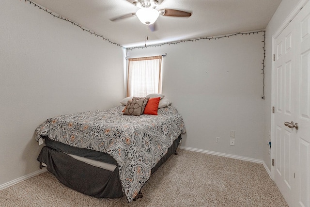 6921 Stonehenge Rd, Odessa, TX 79765 - bedroom with carpet floors and ceiling fan