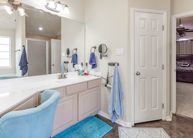 6921 Stonehenge Rd, Odessa, TX 79765 - full bath with a ceiling fan, a shower stall, vanity, and concrete flooring