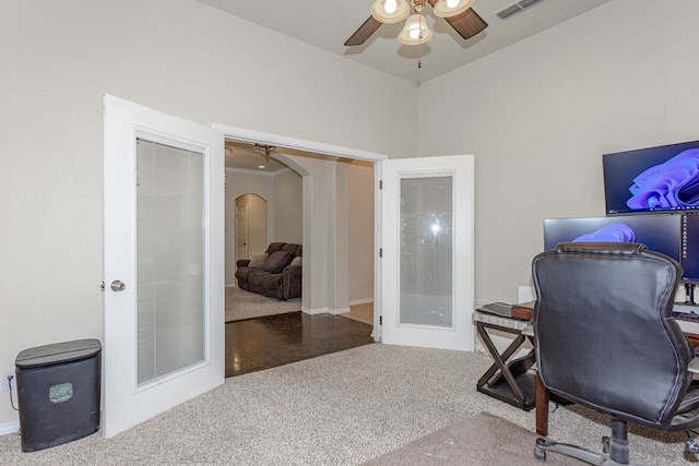 6921 Stonehenge Rd, Odessa, TX 79765 - office area featuring carpet, ceiling fan, arched walkways, and french doors