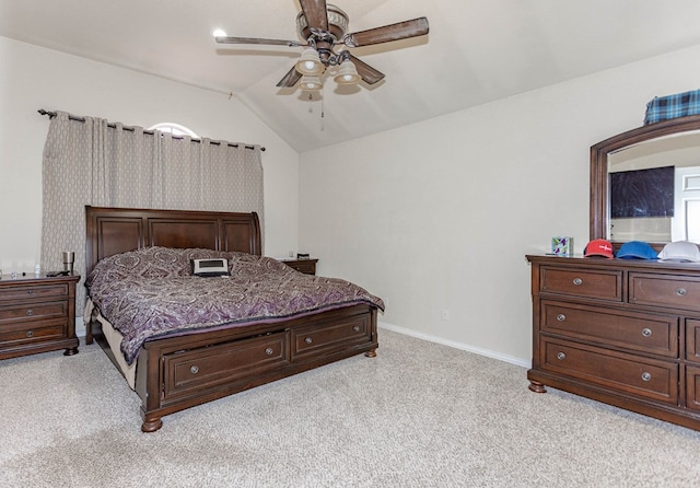 6921 Stonehenge Rd, Odessa, TX 79765 - bedroom with light colored carpet, vaulted ceiling, and ceiling fan
