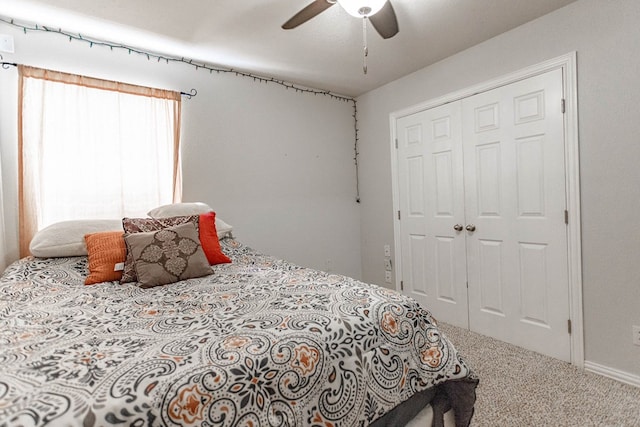 6921 Stonehenge Rd, Odessa, TX 79765 - bedroom with a closet, carpet floors, and ceiling fan