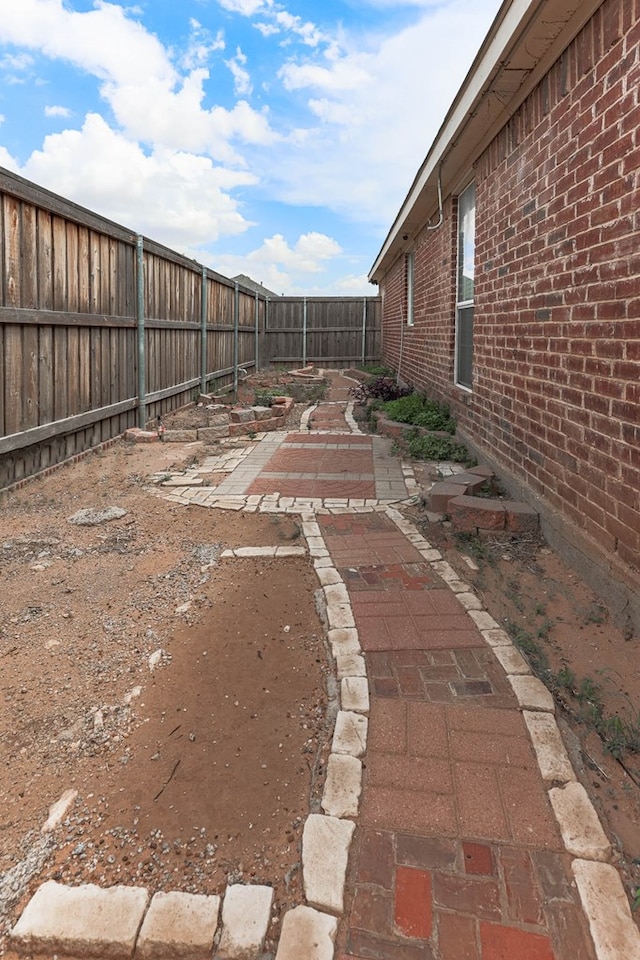 6921 Stonehenge Rd, Odessa, TX 79765 - fenced backyard featuring a patio