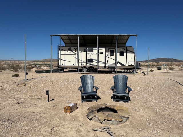 287 Fulcher Rd, Terlingua, TX 79852 - view of yard featuring a mountain view and a detached carport