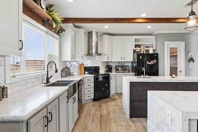 kitchen with beam ceiling, wall chimney exhaust hood, hanging light fixtures, decorative backsplash, and black appliances