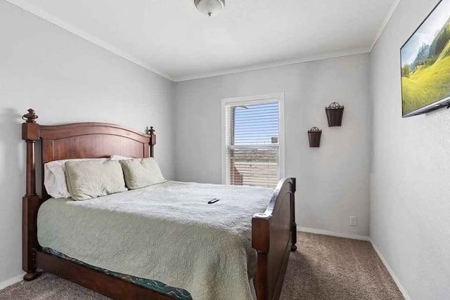 bedroom with carpet and crown molding