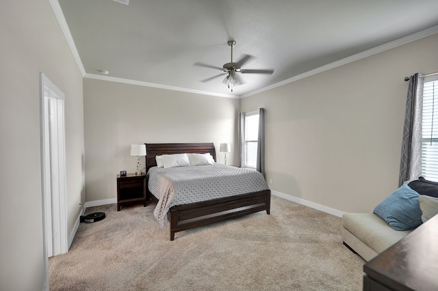 bedroom with multiple windows, ornamental molding, baseboards, light colored carpet, and a ceiling fan