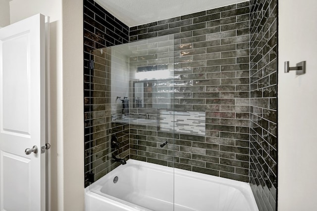 bathroom featuring washtub / shower combination