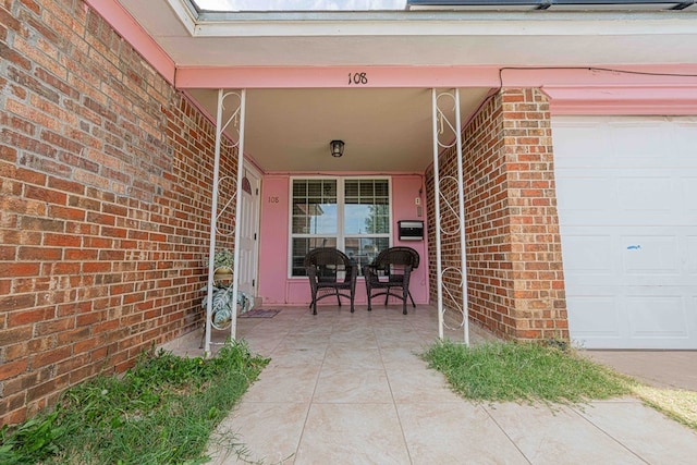 entrance to property with covered porch