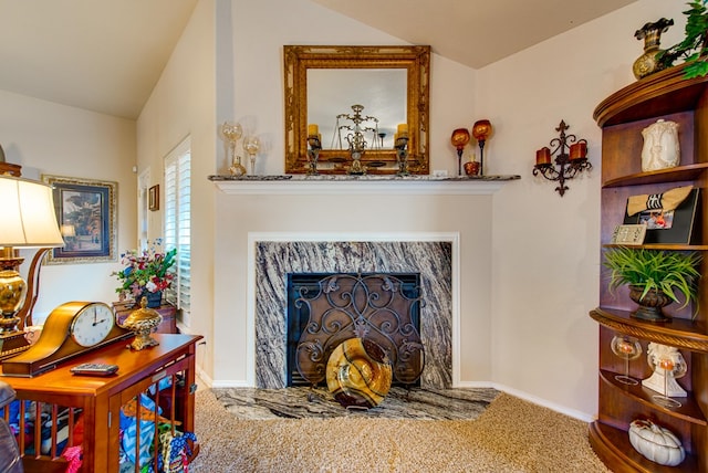 6920 Stonehenge Rd, Odessa, TX 79765 - carpeted living room with lofted ceiling and baseboards