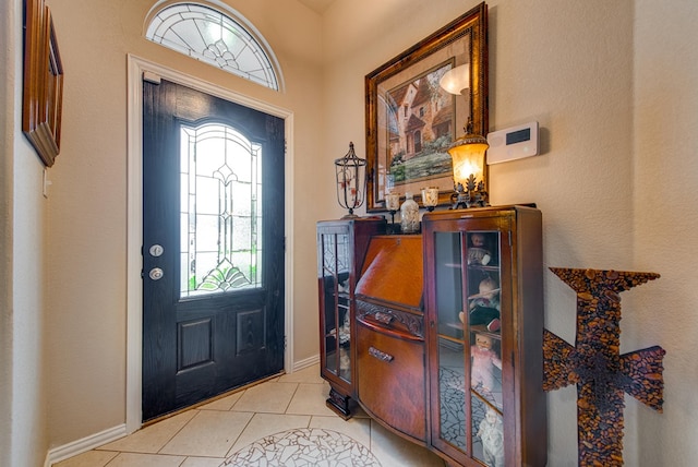 6920 Stonehenge Rd, Odessa, TX 79765 - entrance foyer featuring light tile patterned flooring and baseboards