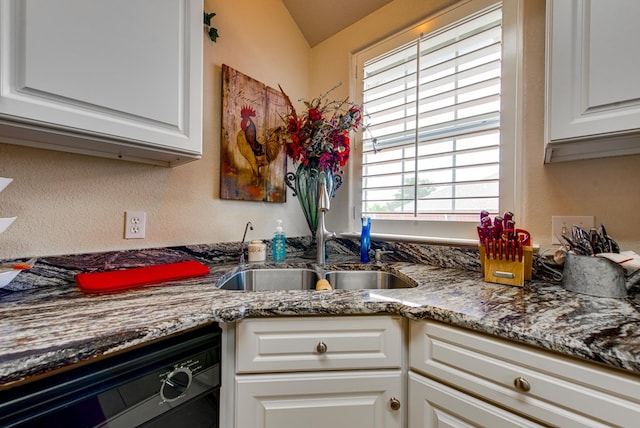 6920 Stonehenge Rd, Odessa, TX 79765 - kitchen with dishwasher, white cabinets, and stone countertops