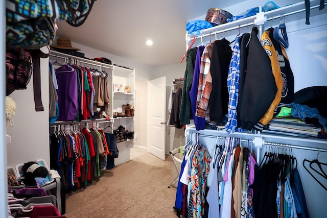 1322 E 89th St, Odessa, TX 79765 - walk in closet featuring carpet flooring