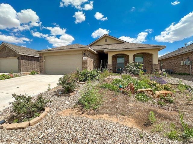 1322 E 89th St, Odessa, TX 79765 - ranch-style house with brick siding, concrete driveway, a garage, and cooling unit