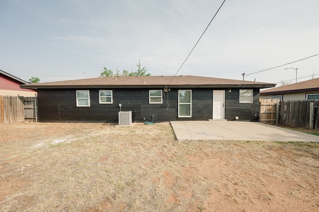 1613 E 52nd St, Odessa, TX 79762 - rear view of house featuring a patio area, a fenced backyard, and central AC unit