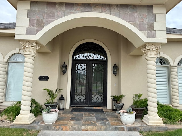 5 Muirfield Dr, Odessa, TX 79762 - view of exterior entry with stucco siding and stone siding