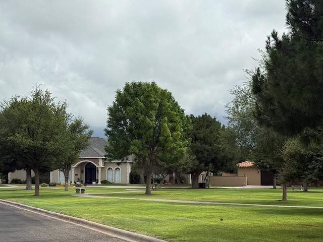 5 Muirfield Dr, Odessa, TX 79762 - view of home's community with a lawn