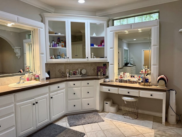 5 Muirfield Dr, Odessa, TX 79762 - bathroom featuring crown molding, tile patterned flooring, backsplash, vanity, and recessed lighting