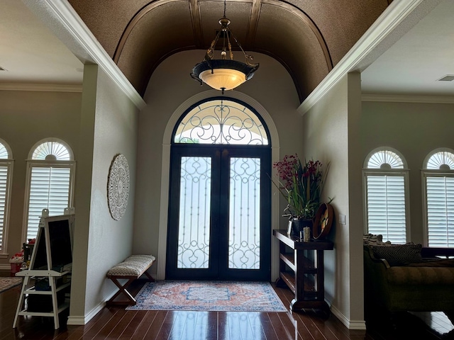 5 Muirfield Dr, Odessa, TX 79762 - foyer featuring plenty of natural light, dark wood-style flooring, and lofted ceiling