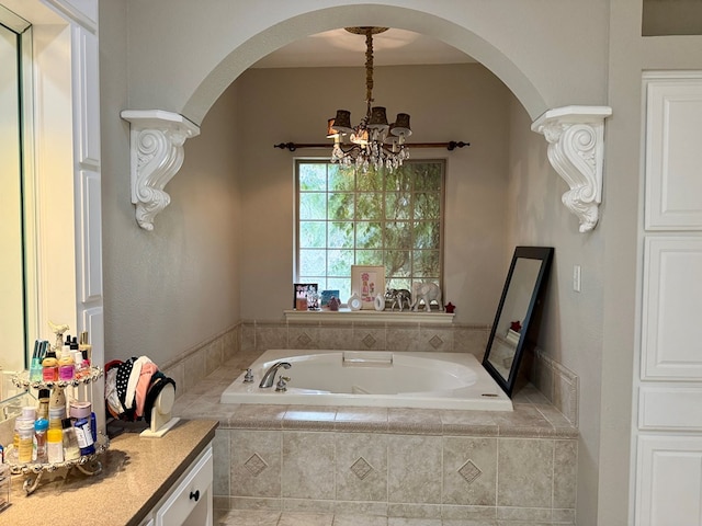 5 Muirfield Dr, Odessa, TX 79762 - full bathroom with a chandelier, a bath, and vanity