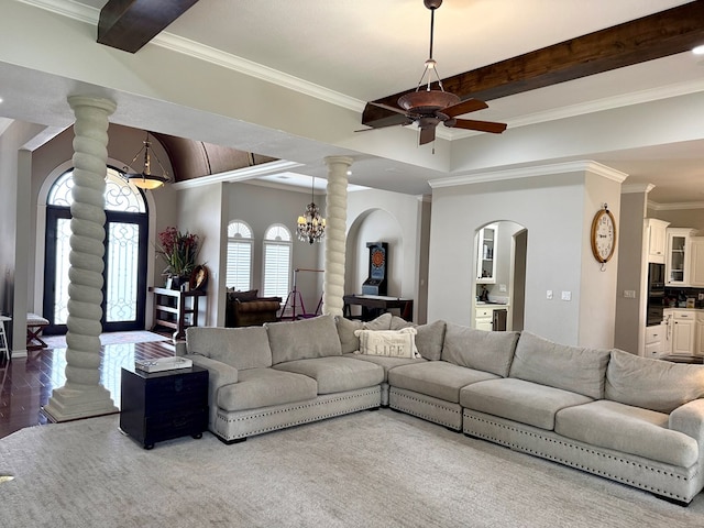 5 Muirfield Dr, Odessa, TX 79762 - living area with ornate columns, arched walkways, crown molding, a ceiling fan, and wood finished floors