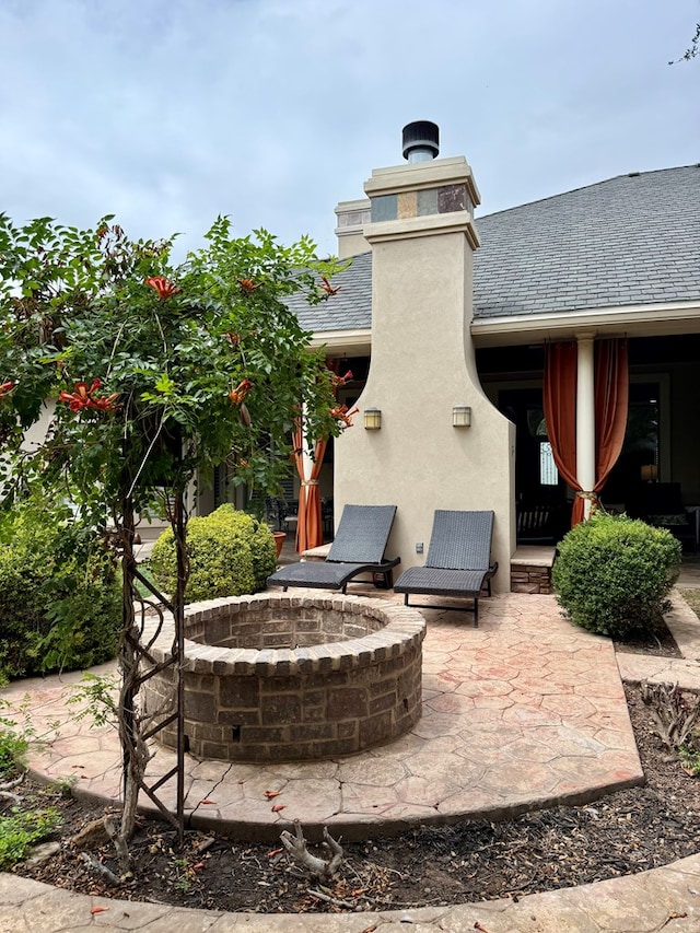 5 Muirfield Dr, Odessa, TX 79762 - view of patio / terrace featuring a fire pit