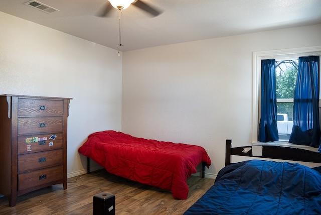 700 NE 2nd St, Andrews, TX 79714 - bedroom with wood finished floors and ceiling fan