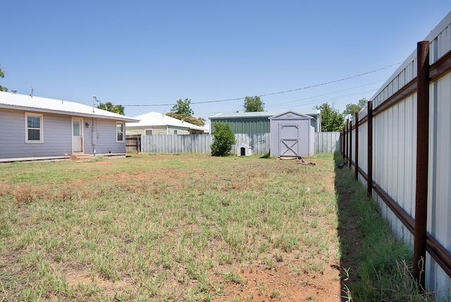 700 NE 2nd St, Andrews, TX 79714 - view of yard with a storage unit