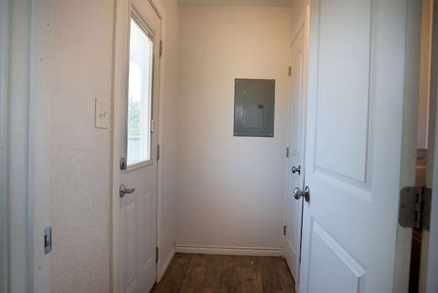 700 NE 2nd St, Andrews, TX 79714 - doorway featuring electric panel and dark wood-style floors