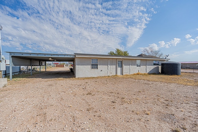 view of outbuilding featuring a carport