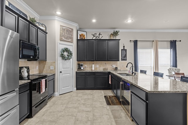 800 94th, Odessa, TX 79765 - kitchen featuring black appliances, a sink, a peninsula, ornamental molding, and light stone countertops