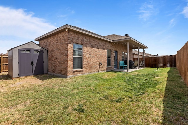 800 94th, Odessa, TX 79765 - back of property with brick siding and a patio area