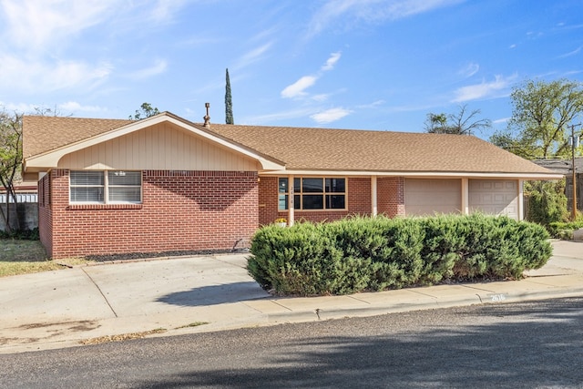 2616 E 21st St, Odessa, TX 79761 - single story home featuring a garage, brick siding, and a shingled roof