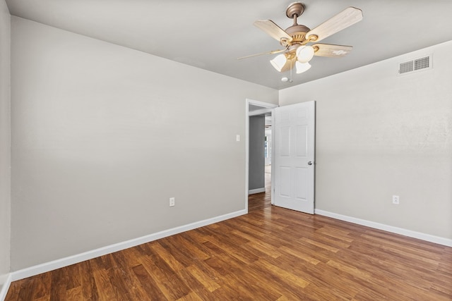 2616 E 21st St, Odessa, TX 79761 - empty room with wood finished floors, baseboards, and a ceiling fan